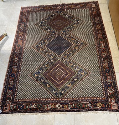 Lot 550 - A Persian Khamseh rug, 143 by 193cm