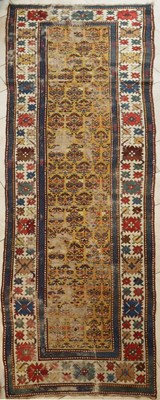 Lot 553 - A Caucasian or Kurdish yellow ground runner,...