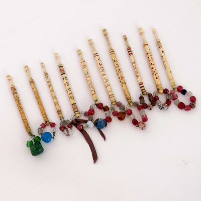 Lot 584 - Ten 19th Century spot name inscribed bone lace...