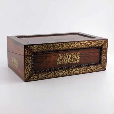 Lot 593 - A Victorian rosewood and brass inlaid writing...