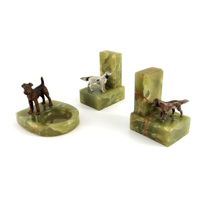 Lot 597 - A pair of Austrian bronze dogs bookends, cold...