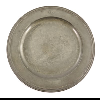 Lot 662 - A 18th century pewter reeded charger,...