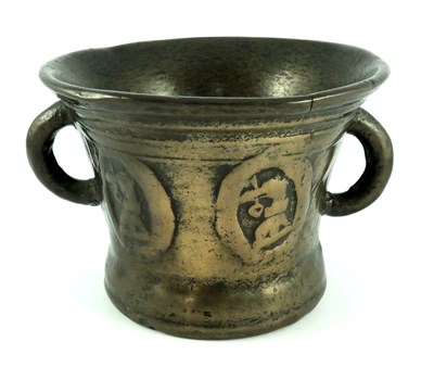 Lot 663 - A 17th century twin handled bronze mortar,...