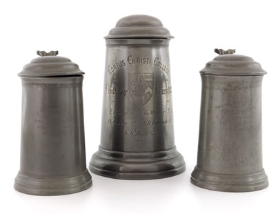 Lot 675 - A group of three pewter sporting trophies,...