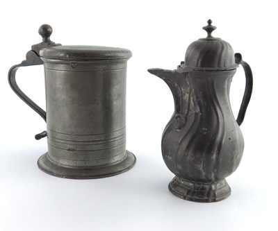 Lot 685 - A large German pewter tankard, dated 1733, and...