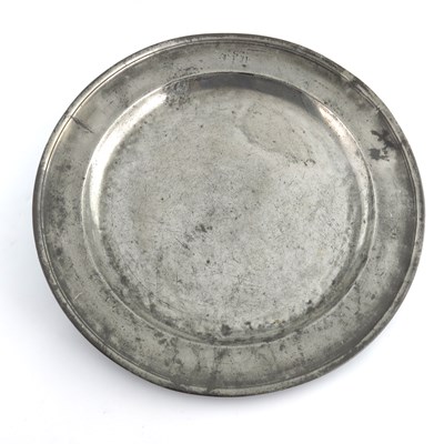 Lot 687 - Three pewter chargers, including a 20 inch...