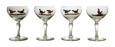 Lot 894 - A set of four Art Deco enamelled glass...