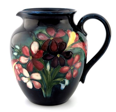 Lot 926 - Walter Moorcroft, a Spring Flowers jug, circa...