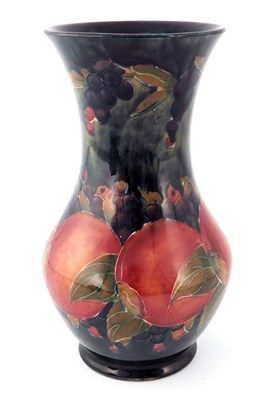 Lot 932 - William Moorcroft, a Pomegranate vase, 1918,...