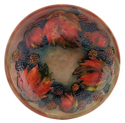 Lot 938 - William Moorcroft, a Flambe Leaf and...