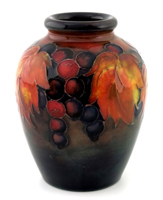 Lot 950 - William Moorcroft, a Flambe Leaf and Berry...