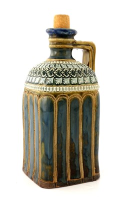Lot 974 - Doulton Lambeth, a stoneware brandy flask,...