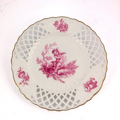 Lot 1025 - A Minton painted plate, decorated with a putto...