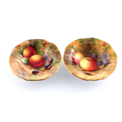 Lot 1075 - A near pair of Royal Worcester fruit painted...