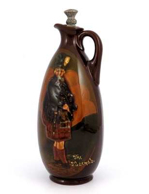 Lot 1091 - A Royal Doulton Kingsware Dewars Whisky flagon,...