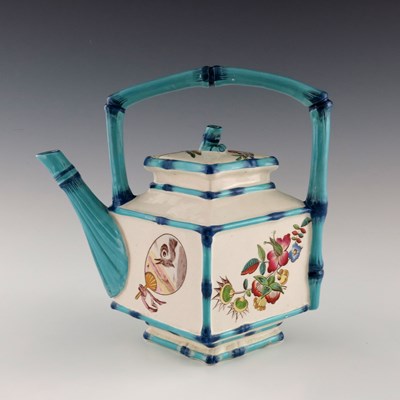 Lot 1106 - A Japonesque faience teapot, circa 1880,...
