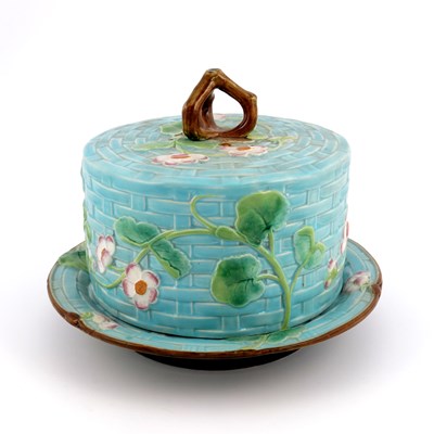 Lot 1113 - George Jones, a Victorian majolica cheese dome...