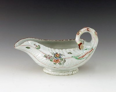 Lot 1117 - A Worcester polychrome cos lettuce moulded...