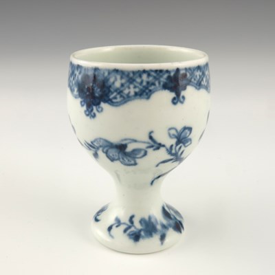 Lot 1133 - A Worcester blue and white egg cup, circa 1770,...