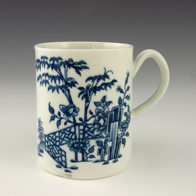 Lot 1142 - A Worcester blue and white mug, circa 1765,...