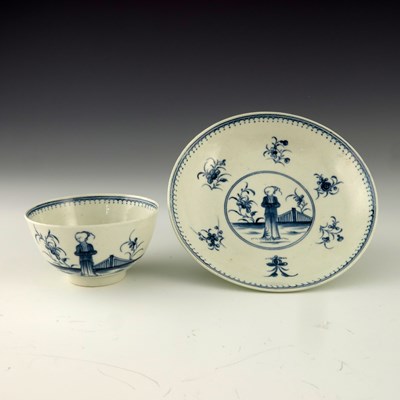 Lot 1148 - A Worcester blue and white tea bowl and saucer,...