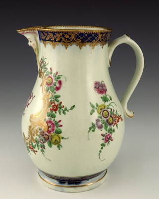 Lot 1163 - A Worcester polychrome mask jug, circa 1770,...