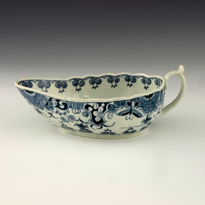 Lot 1168 - A Worcester blue and white sauce boat, circa...