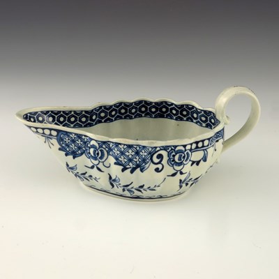Lot 1169 - A Worcester blue and white sauce boat, circa...