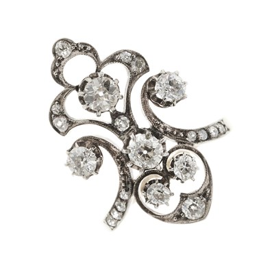 Lot 103 - A late Victorian gold and silver diamond openwork dress ring