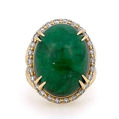 Lot 22 - A large cabochon emerald and diamond cluster...