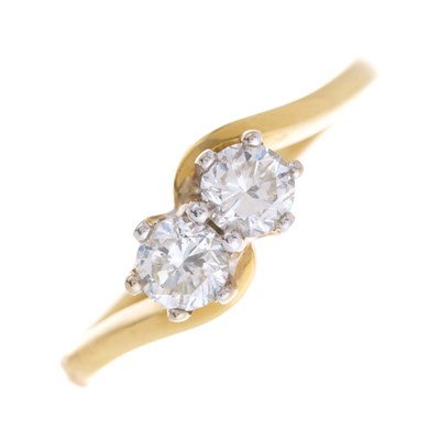 Lot 9 - An 18ct gold brilliant-cut diamond two-stone...