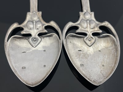 Lot 71 - A pair of Arts and Crafts silver spoons, TW,...