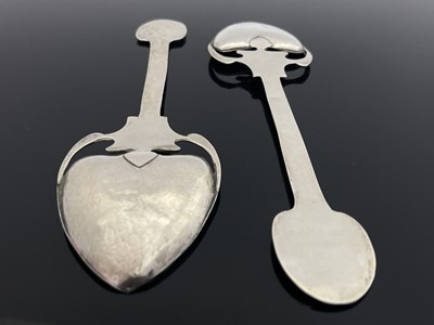 Lot 71 - A pair of Arts and Crafts silver spoons, TW,...