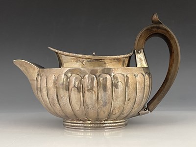 Lot 55 - A George III silver teapot, Peter, Ann and...