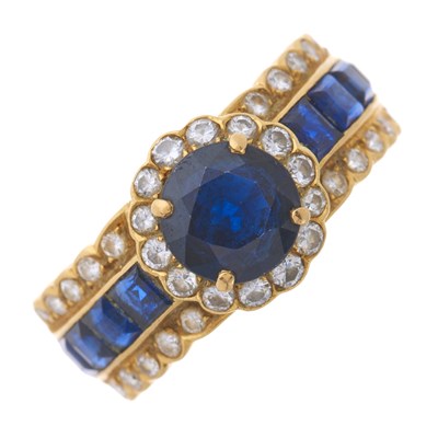 Lot 199 - An 18ct gold sapphire and brilliant-cut...