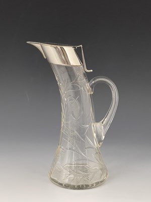 Lot 115 - An Arts and Crafts silver plated and cut glass...