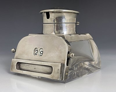 Lot 64 - A George V silver and glass calendar inkwell,...