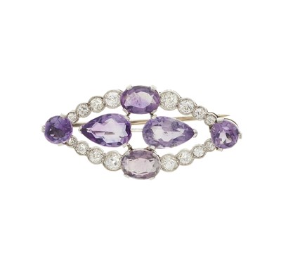 Lot 212 - An early 20th century amethyst and diamond openwork brooch