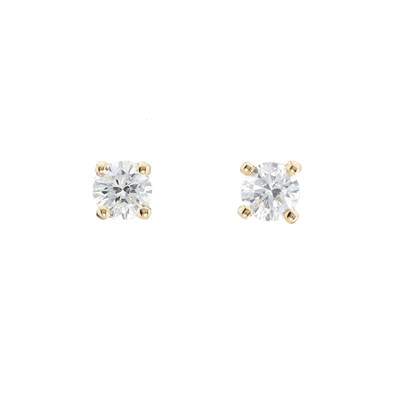 Lot 54 - A pair of 18ct gold diamond single-stone stud earrings
