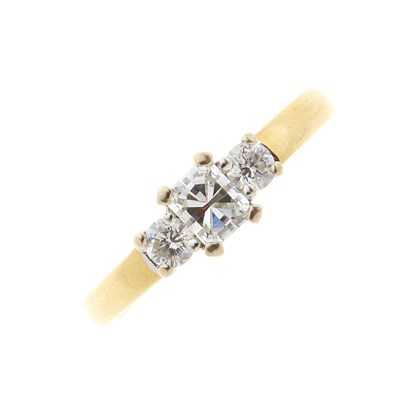 Lot 86 - An 18ct gold diamond three-stone ring