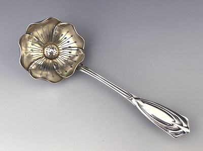 Lot 79 - A Secessionist silver strawberry sugar sifter...
