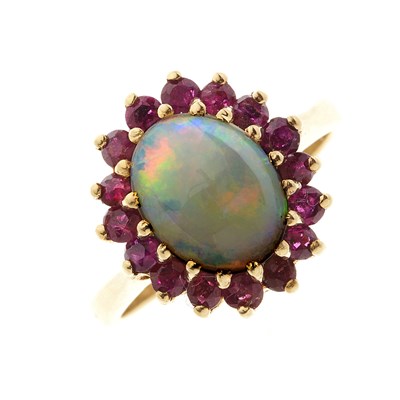 Lot 166 - A gold opal and ruby cluster dress ring