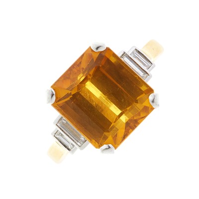 Lot 58 - An 18ct gold orange sapphire and diamond ring