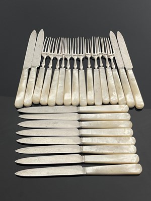 Lot 88 - A set of George V silver and mother of pearl...