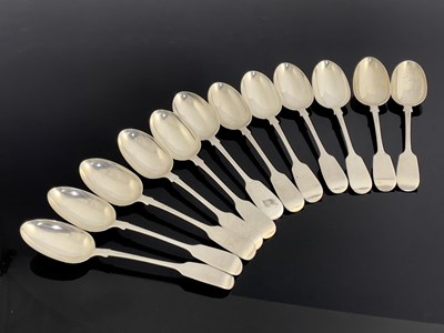 Lot 40 - A set of twelve Victorian silver table spoons,...