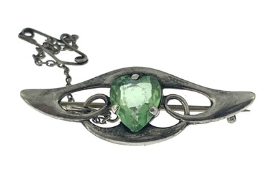 Lot 29 - An Arts and Crafts silver and green stone set...