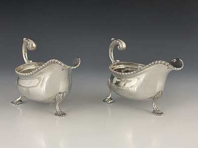 Lot 82 - A pair of Edwardian silver sauce boats,...