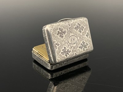 Lot 32 - A George III silver vinaigrette, of rounded...
