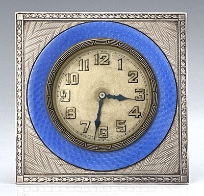 Lot 109 - An Art Deco silver and enamelled clock, Turner...