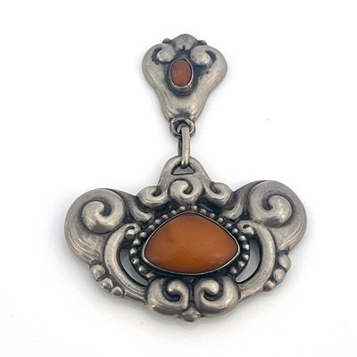 Lot 38 - A Danish Skonvirke silver and amber brooch,...
